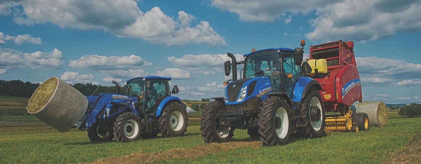 two blue tractors